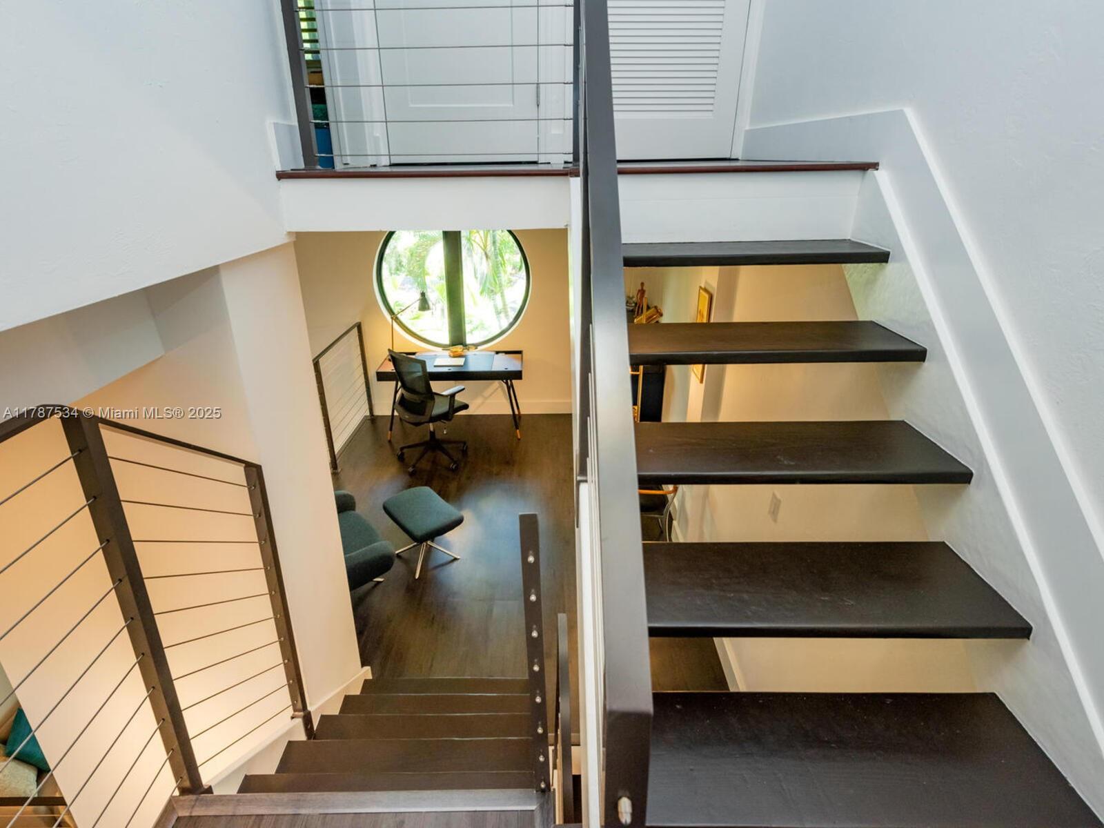 3229 Mary Street, Unit 2 Miami, FL 33133 - Photo 39 of 56 a view of staircase with a rug