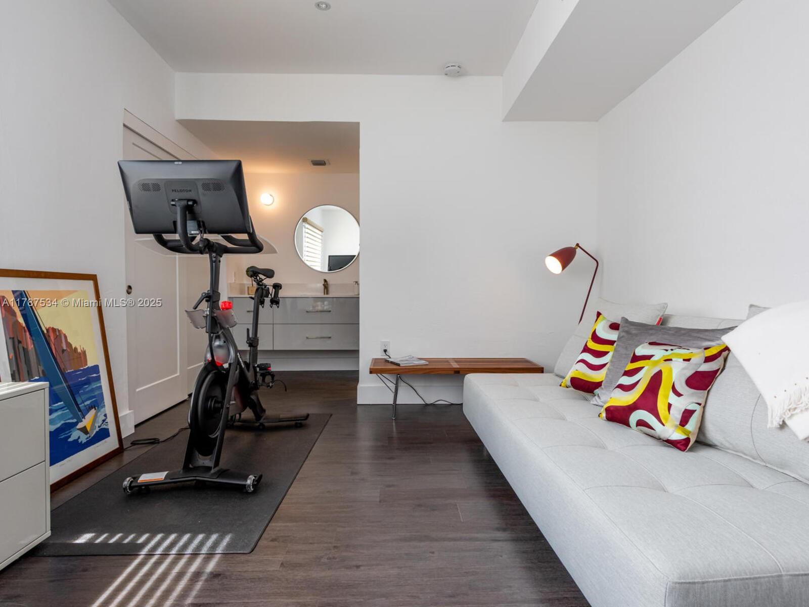 3229 Mary Street, Unit 2 Miami, FL 33133 - Photo 41 of 56 a view of a room with gym equipment