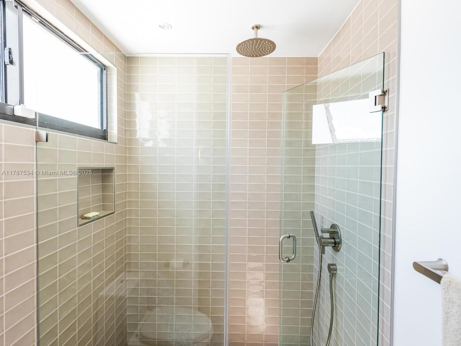 3229 Mary Street, Unit 2 Miami, FL 33133 - Photo 52 of 56 a bathroom with a shower