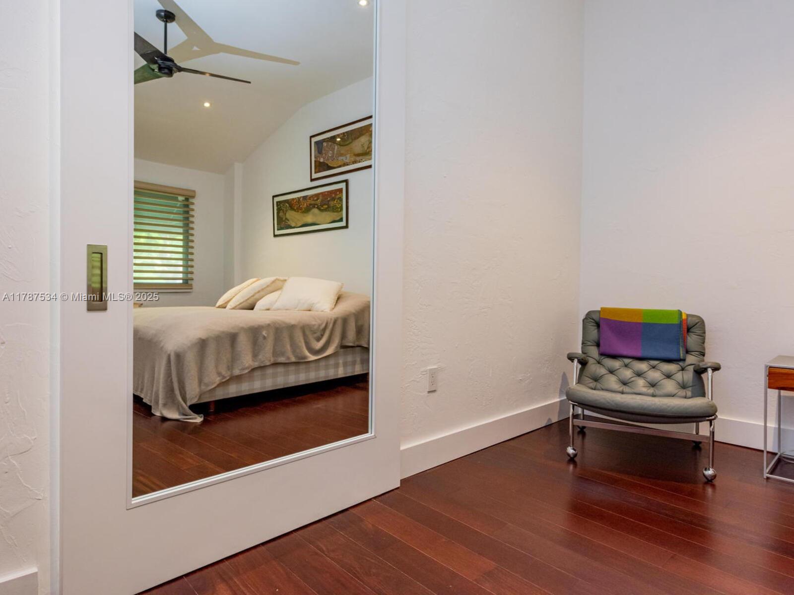 3229 Mary Street, Unit 2 Miami, FL 33133 - Photo 54 of 56 a bedroom with bed and a window