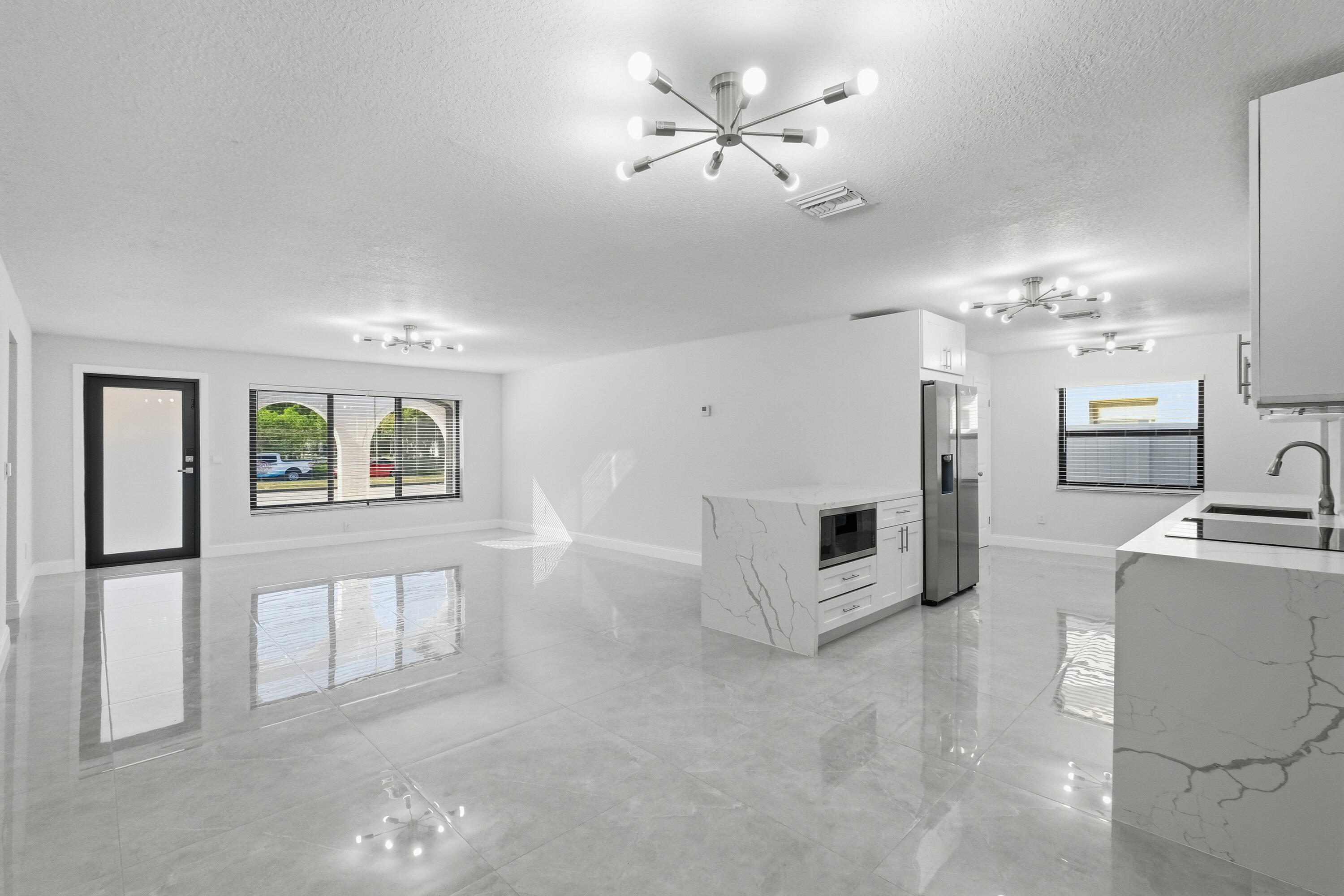 22390 Southwest 66th Avenue Boca Raton, FL 33428 - Photo 15 of 58 a view of a livingroom with furniture and cabinet
