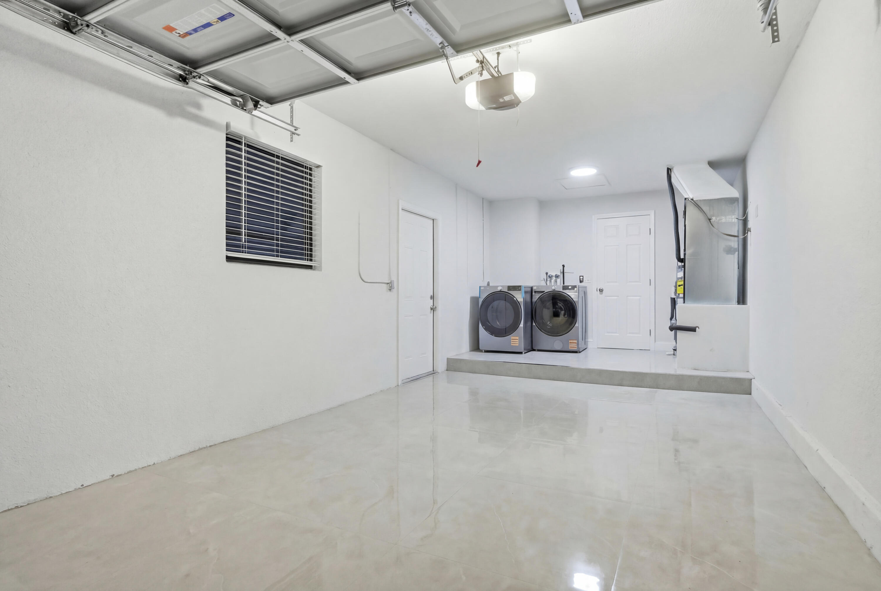 22390 Southwest 66th Avenue Boca Raton, FL 33428 - Photo 42 of 58 a view of a livingroom with furniture and a ceiling fan