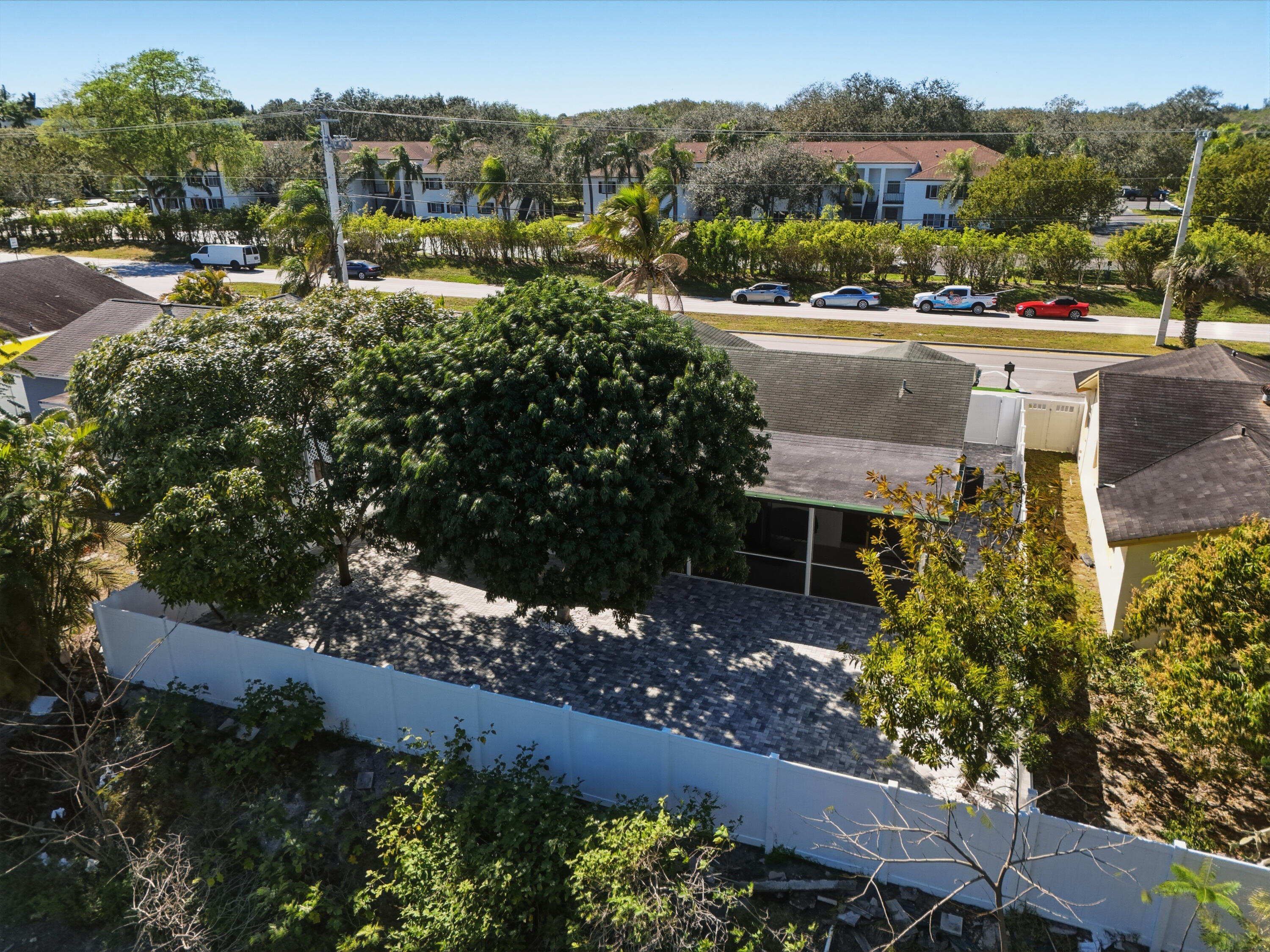 22390 Southwest 66th Avenue Boca Raton, FL 33428 - Photo 55 of 58 a view of a city with lush green forest