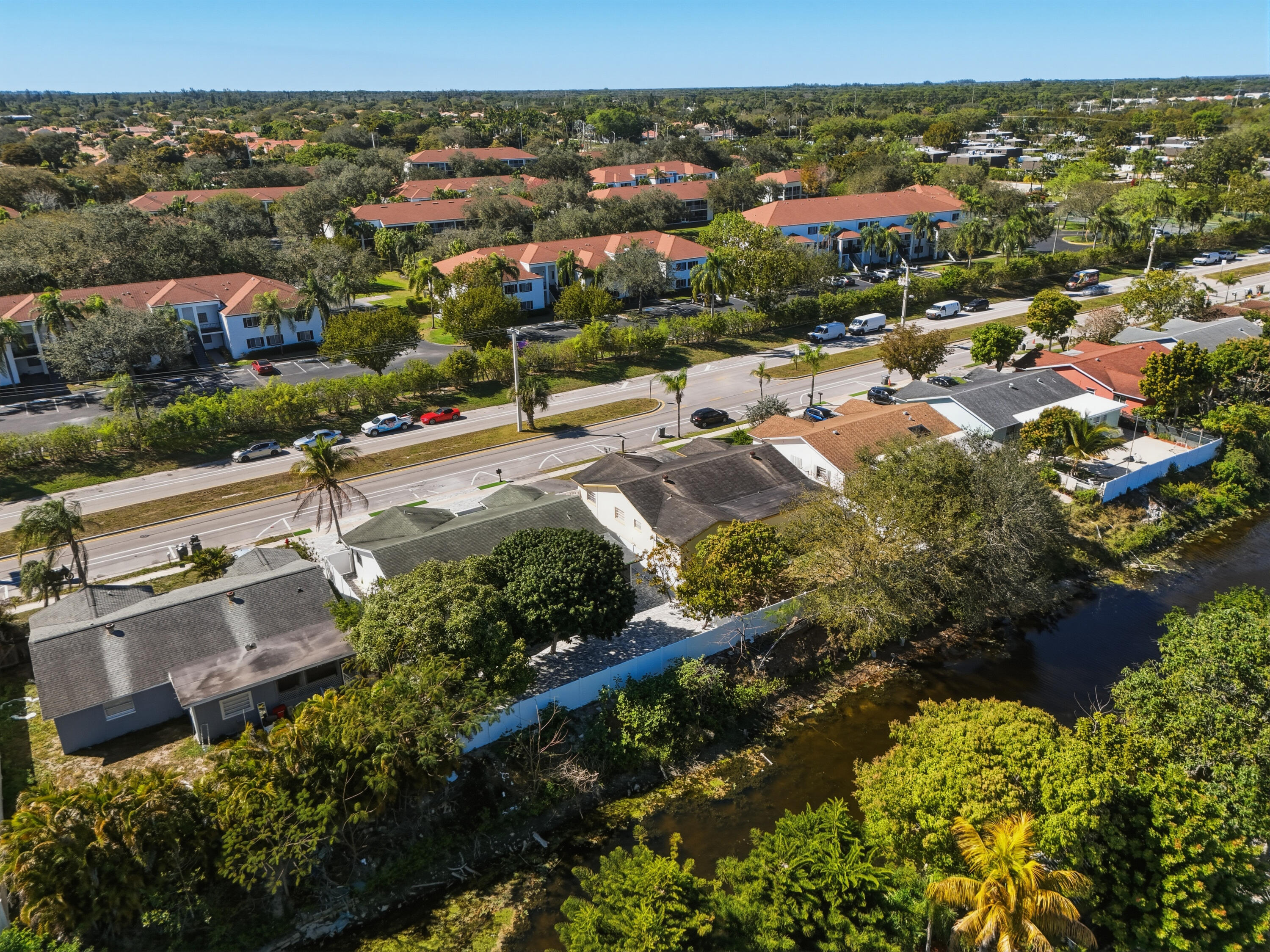 22390 Southwest 66th Avenue Boca Raton, FL 33428 - Photo 56 of 58 an aerial view of residential houses with outdoor space