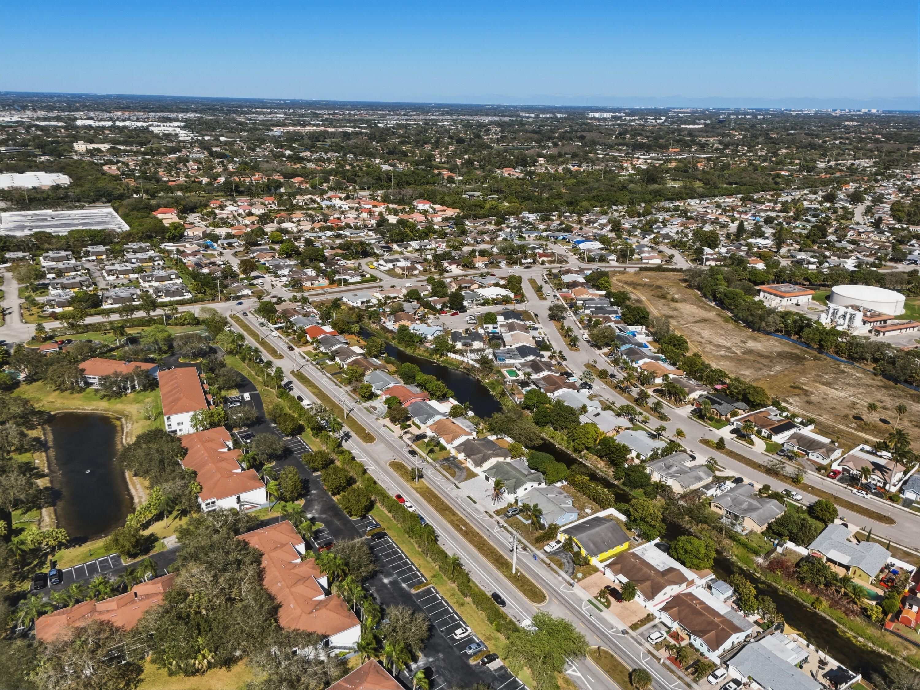 22390 Southwest 66th Avenue Boca Raton, FL 33428 - Photo 57 of 58 an aerial view of residential building with parking