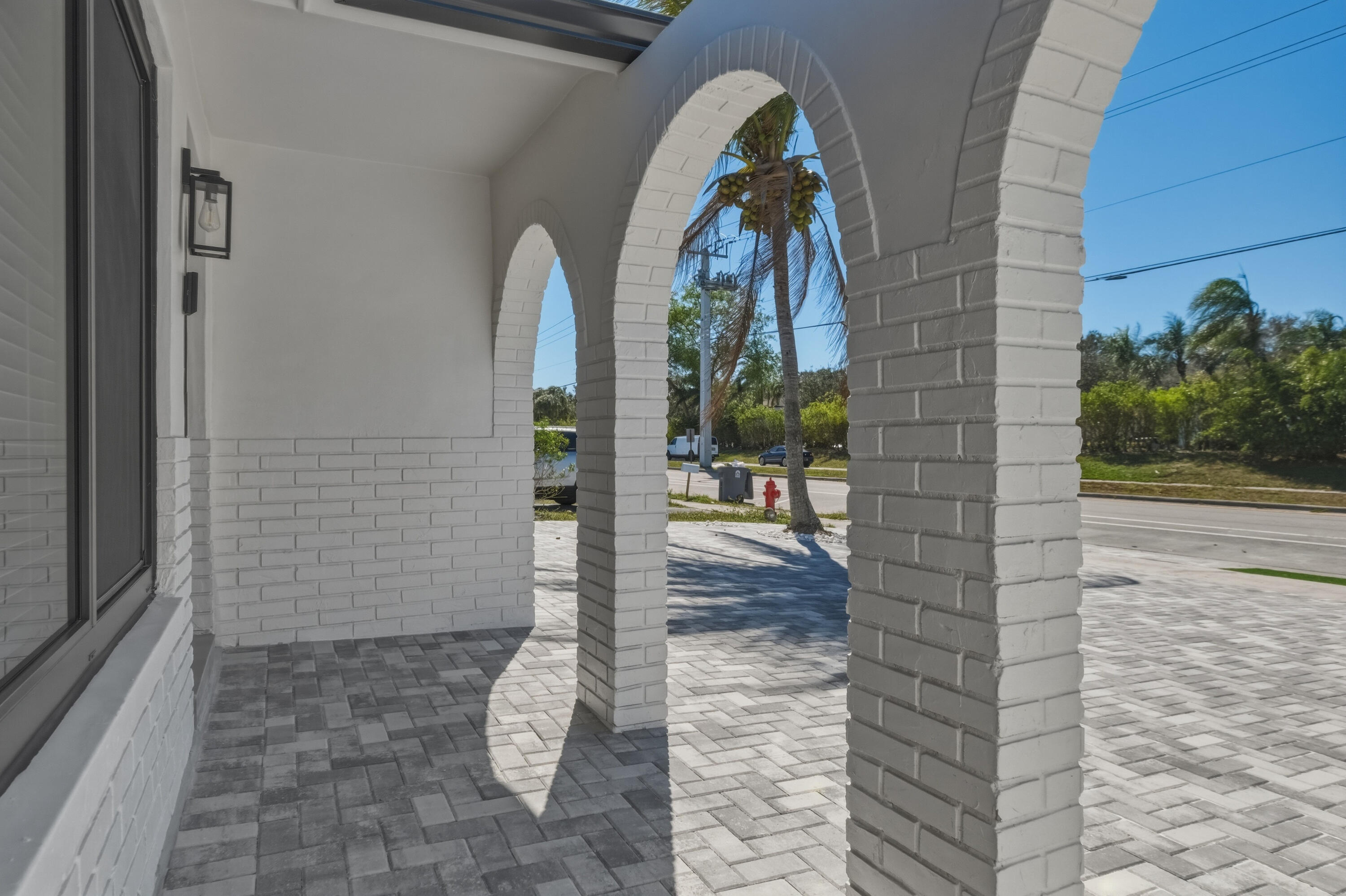 22390 Southwest 66th Avenue Boca Raton, FL 33428 - Photo 8 of 58 a view of a entryway door of the house