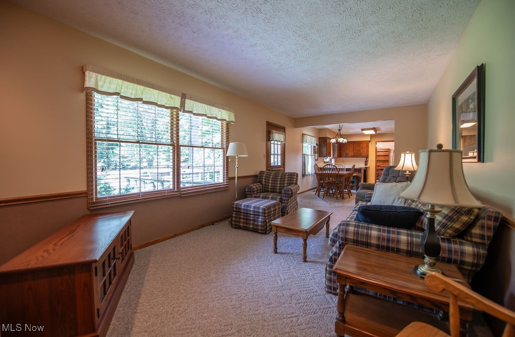 3949 Bair Road Northwest Dover, OH 44622 - Photo 16 of 48 Family room and dining area view
