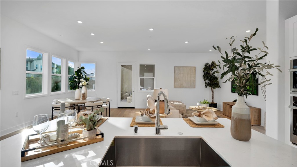 113 Junco Irvine, CA 92618 - Photo 16 of 47 a view of a dining room with furniture window and outside view
