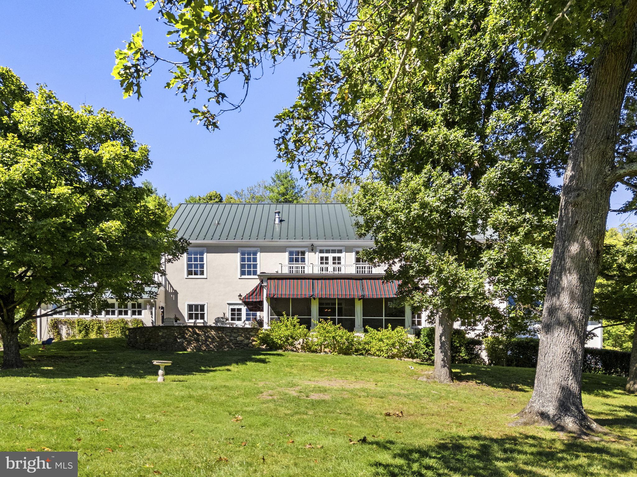 1663 Hatchers Mill Road Marshall, VA 20115 - Photo 24 of 60 Back of main house w/screened in porch & awnings