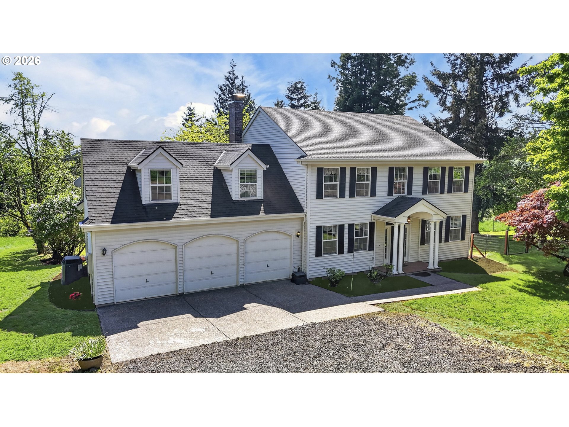 33498 Smith Road St. Helens, OR 97051 - Photo 1 of 34 a house view with a garden space