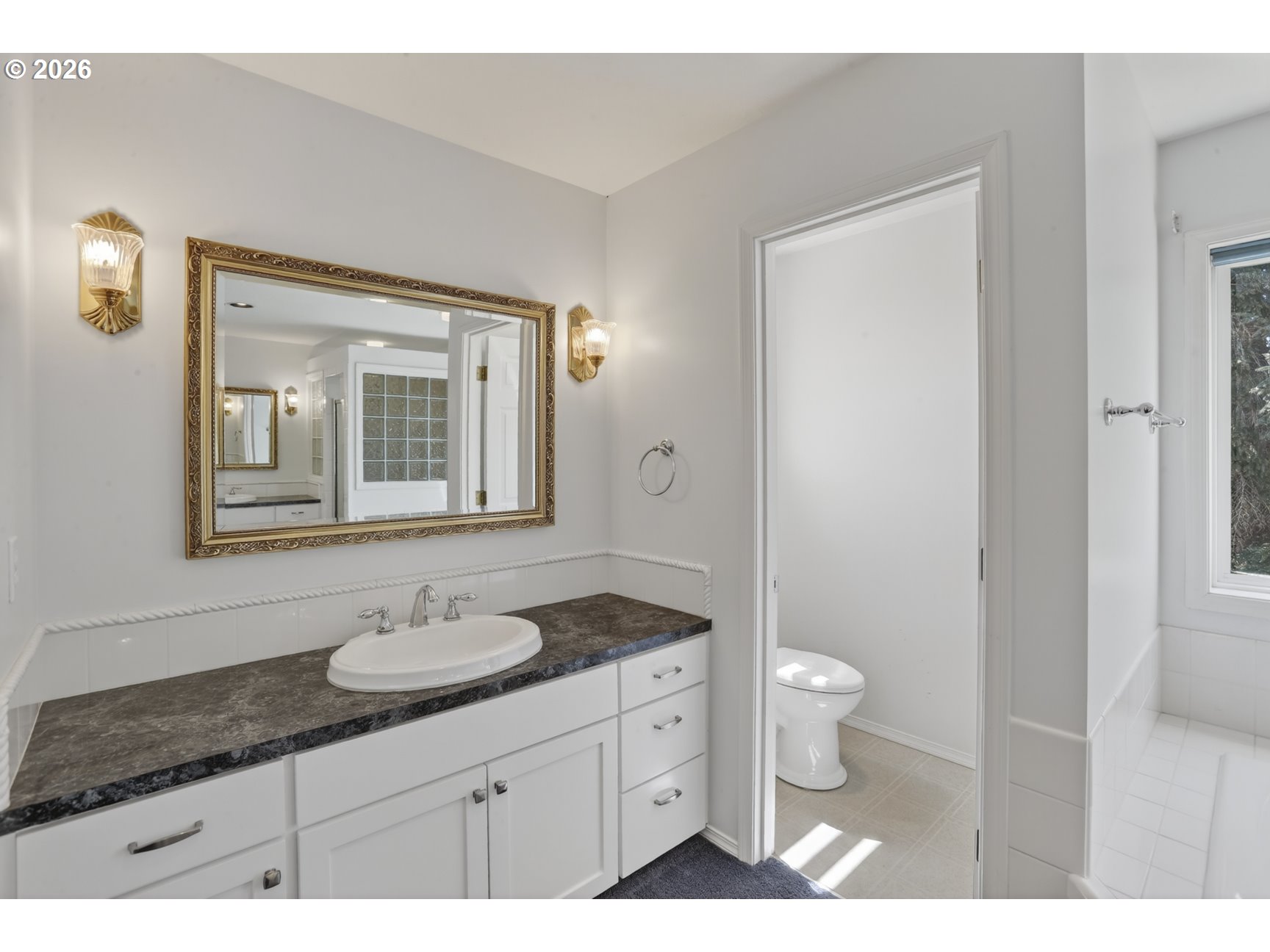 33498 Smith Road St. Helens, OR 97051 - Photo 18 of 34 a bathroom with a granite countertop sink toilet and mirror