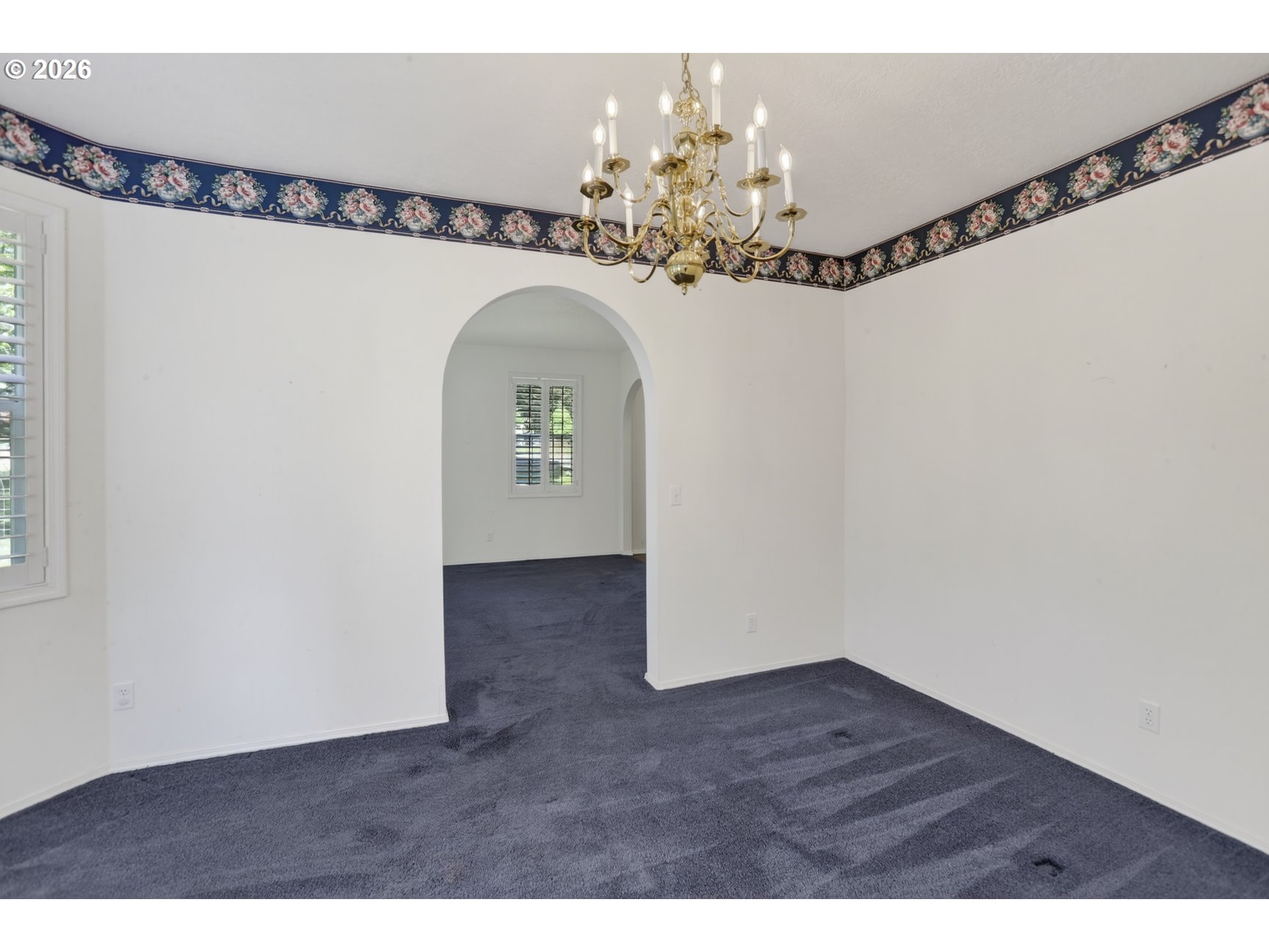 33498 Smith Road St. Helens, OR 97051 - Photo 10 of 34 a view of a room with wooden floor and chandelier