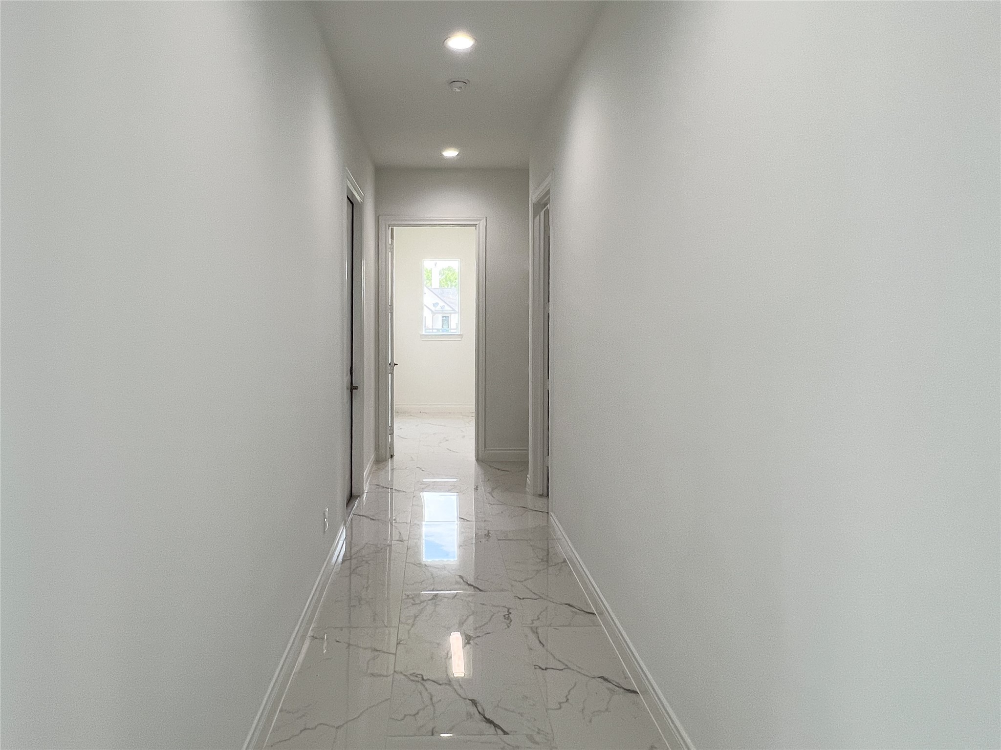 126 Lakeland Circle Rosharon, TX 77583 - Photo 24 of 49 a view of a hallway with wooden floor