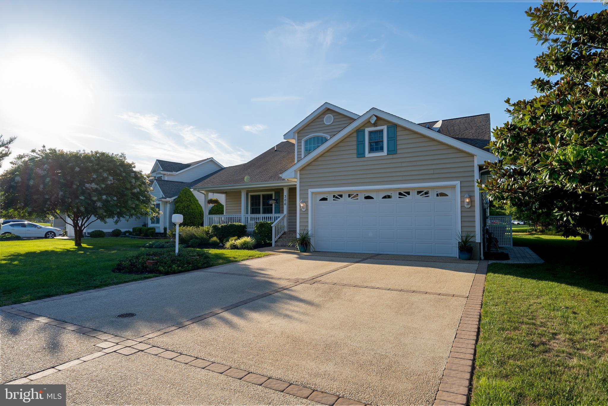 306 Walkabout Road Bethany Beach, DE 19930 - Photo 6 of 63 Driveway with Pavers