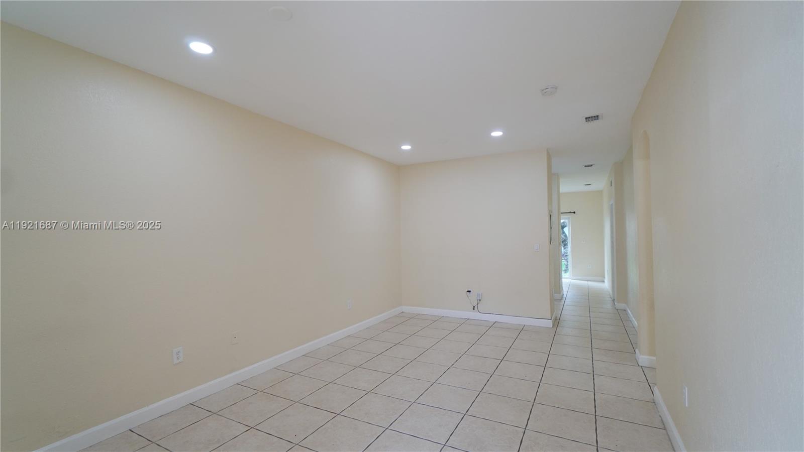 1535 Southeast 26th Street, Unit 103 Homestead, FL 33035 - Photo 2 of 26 a view of an empty room