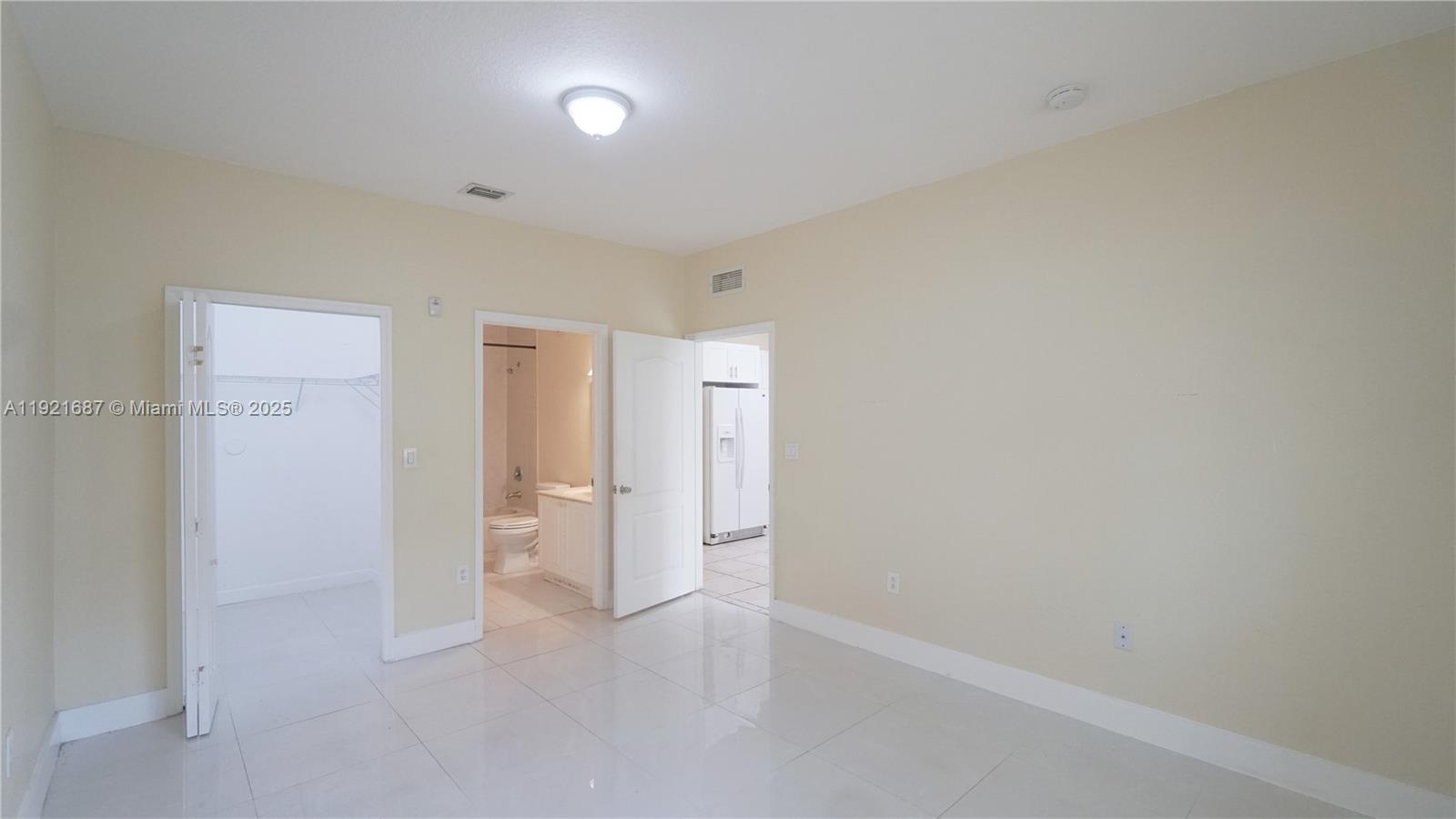 1535 Southeast 26th Street, Unit 103 Homestead, FL 33035 - Photo 21 of 26 a view of an empty room