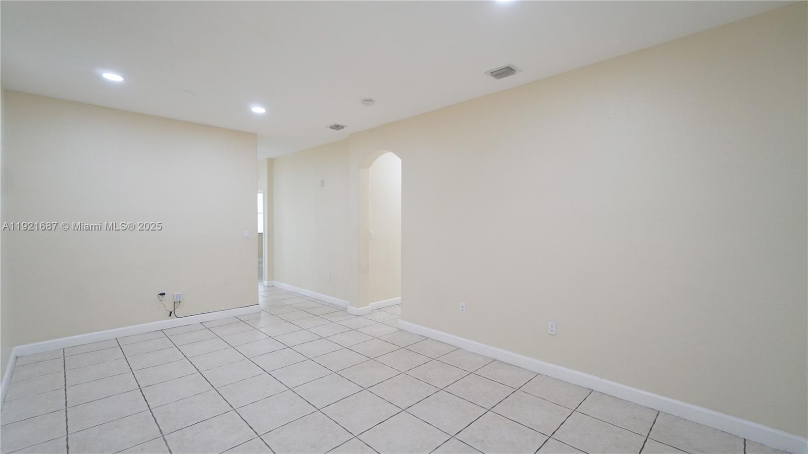 1535 Southeast 26th Street, Unit 103 Homestead, FL 33035 - Photo 3 of 26 a view of an empty room