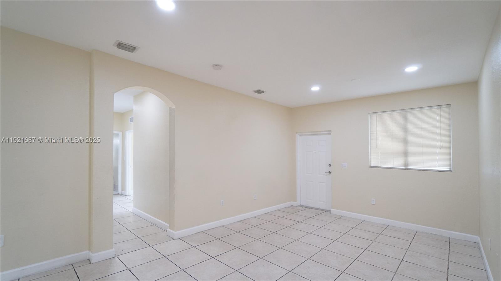 1535 Southeast 26th Street, Unit 103 Homestead, FL 33035 - Photo 4 of 26 a view of an empty room