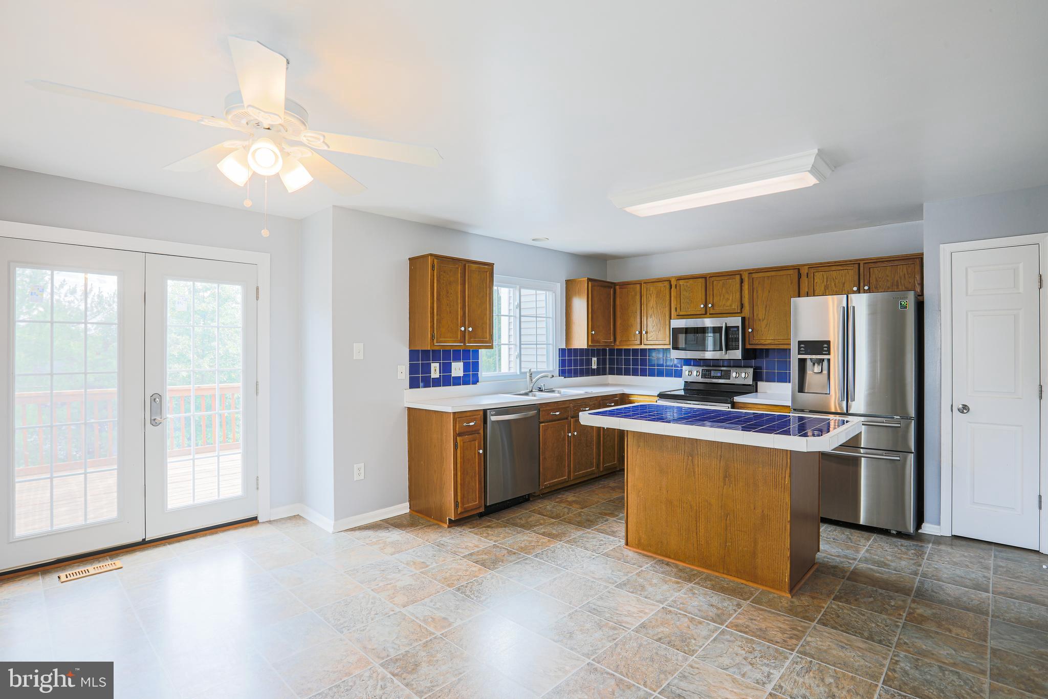 4434 Silver Teal Road Baltimore, MD 21236 - Photo 19 of 50 Kitchen w/ tile island.