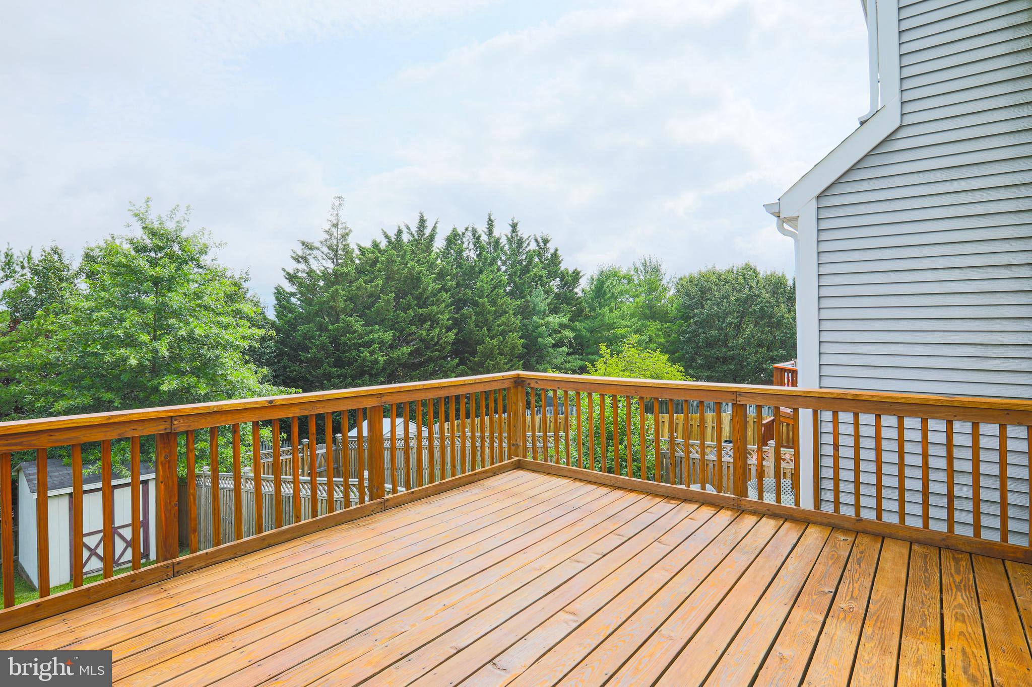 4434 Silver Teal Road Baltimore, MD 21236 - Photo 29 of 50 Freshly stained deck.