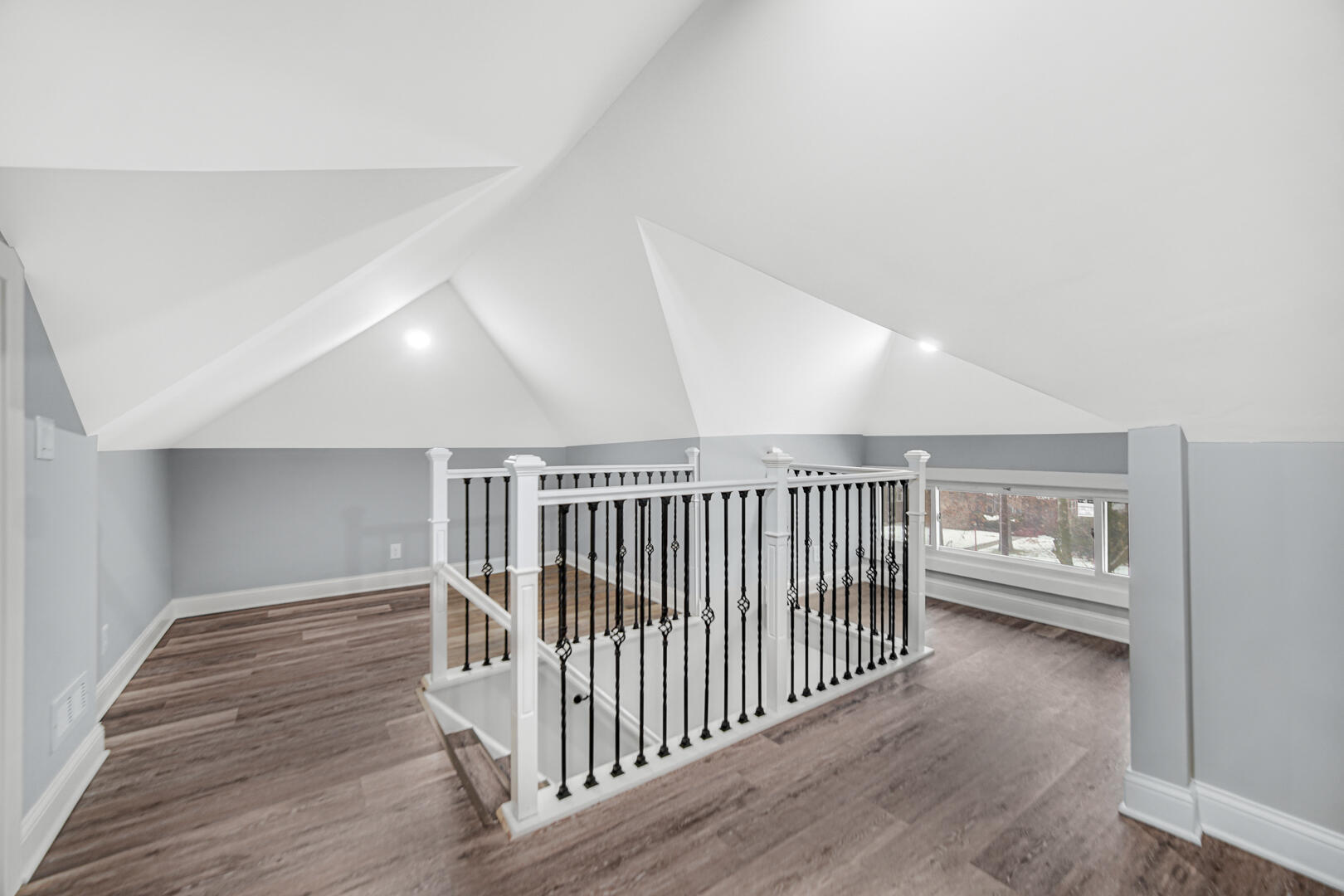 4354 Washington Street Gary, IN 46408 - Photo 20 of 32 a view of a hallway with wooden floor and windows