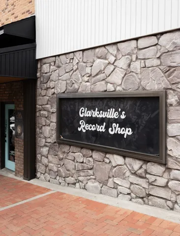 a sign on the side of building