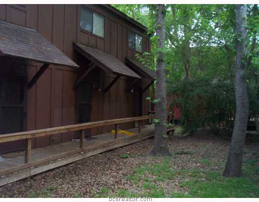 3923 Old Oaks Drive, Unit 2 Bryan, TX 77802 - Photo 1 of 1 a view of backyard with green space