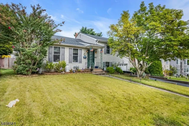 a house view with a garden space