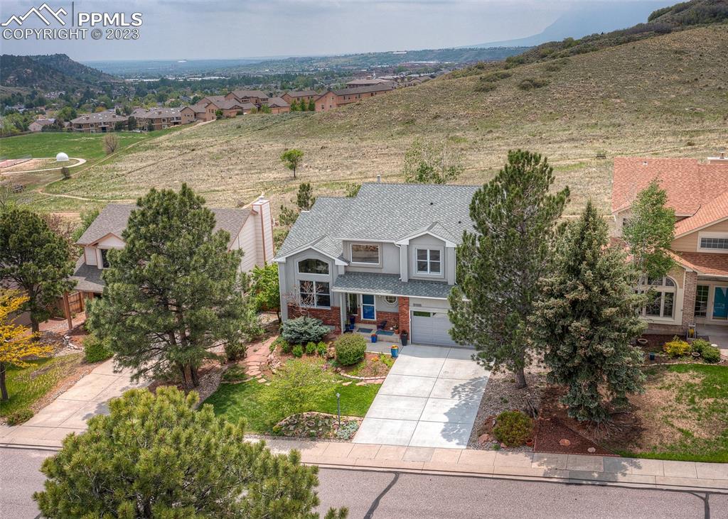 2145 Wickes Road Colorado Springs, CO 80919 - Photo 2 of 50 a aerial view of a house with a lake view