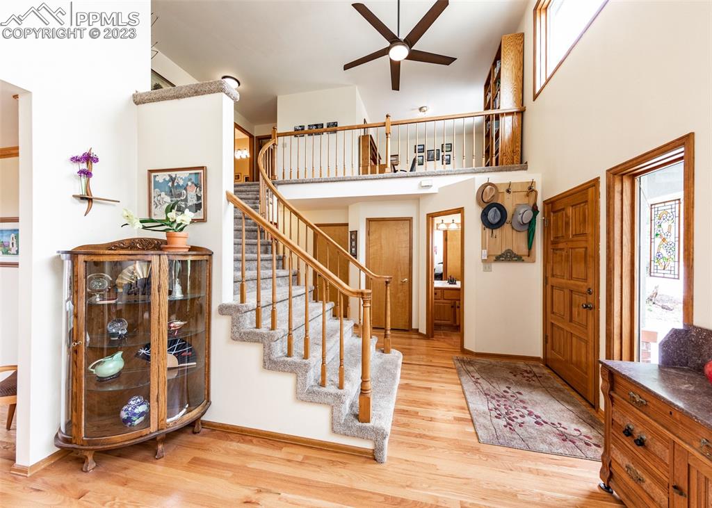 2145 Wickes Road Colorado Springs, CO 80919 - Photo 4 of 50 a view of a hallway with wooden floor and entryway