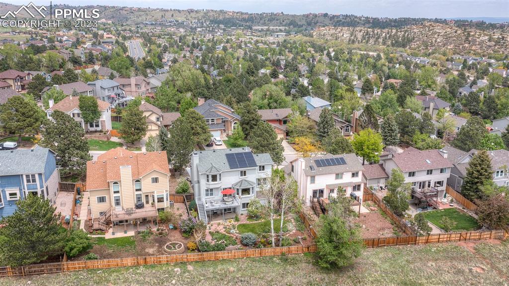 2145 Wickes Road Colorado Springs, CO 80919 - Photo 47 of 50 an aerial view of residential houses with outdoor space