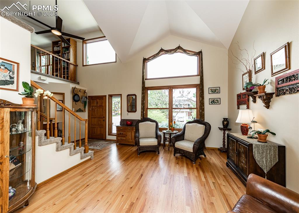 2145 Wickes Road Colorado Springs, CO 80919 - Photo 6 of 50 a view of a livingroom with furniture hardwood floor and a window