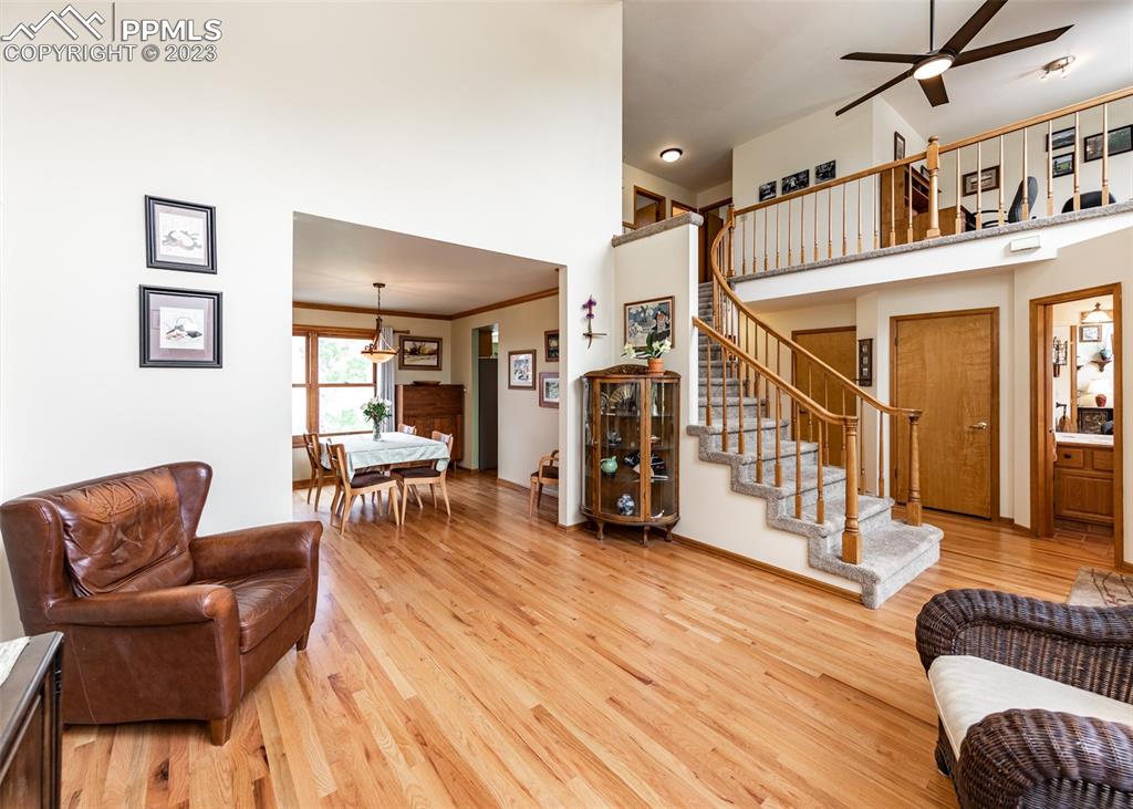 2145 Wickes Road Colorado Springs, CO 80919 - Photo 9 of 50 a living room with furniture and wooden floor