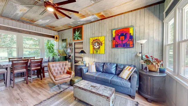 a living room with furniture and a table