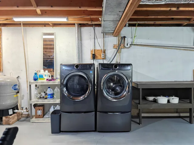 a utility room with dryer and washer