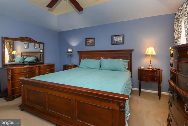 a bedroom with a bed and furniture