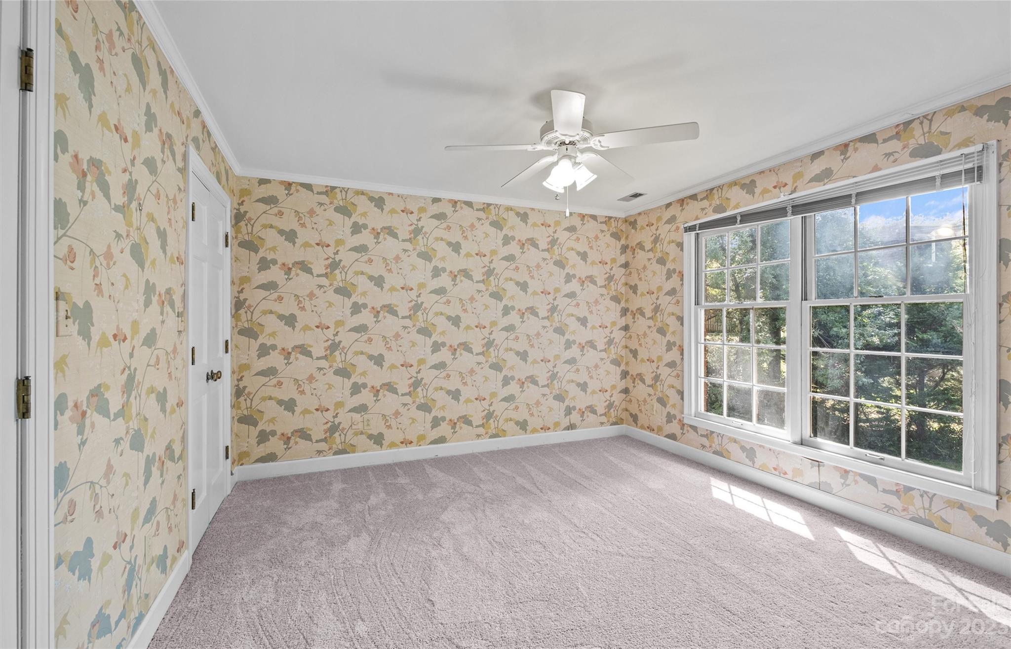 3424 Colony Road Charlotte, NC 28211 - Photo 15 of 48 a view of an empty room with a window