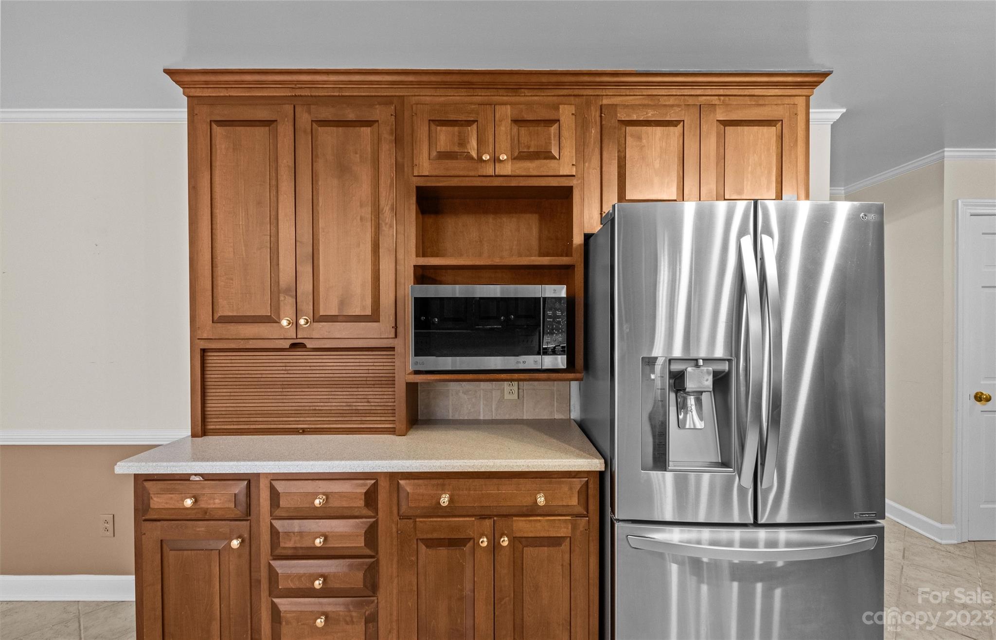 3424 Colony Road Charlotte, NC 28211 - Photo 9 of 48 a kitchen with appliances and a refrigerator