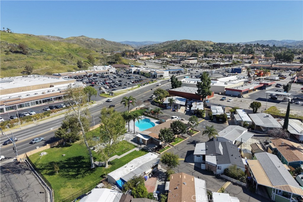 18540 Soledad Canyon Road, Unit 124 Canyon Country, CA 91351 - Photo 20 of 20 an aerial view of a city with lots of residential buildings