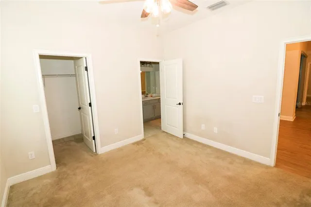 an empty room with a bathroom