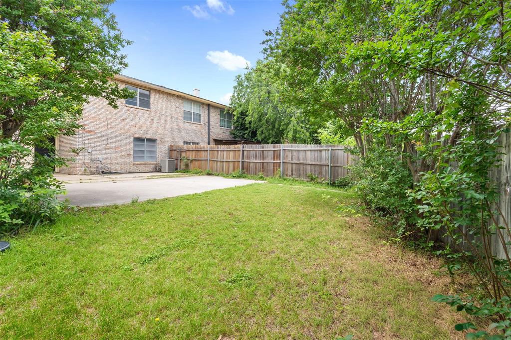 2802 Spring Valley Drive Bedford, TX 76021 - Photo 21 of 24 a house view with outdoor space and sitting space