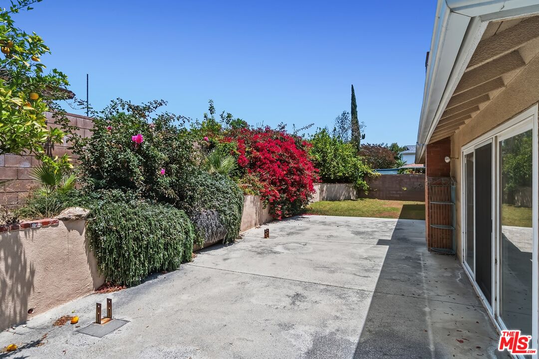 19131 Tulsa Street Porter Ranch, CA 91326 - Photo 37 of 43 a view of a pathway with a house in the background