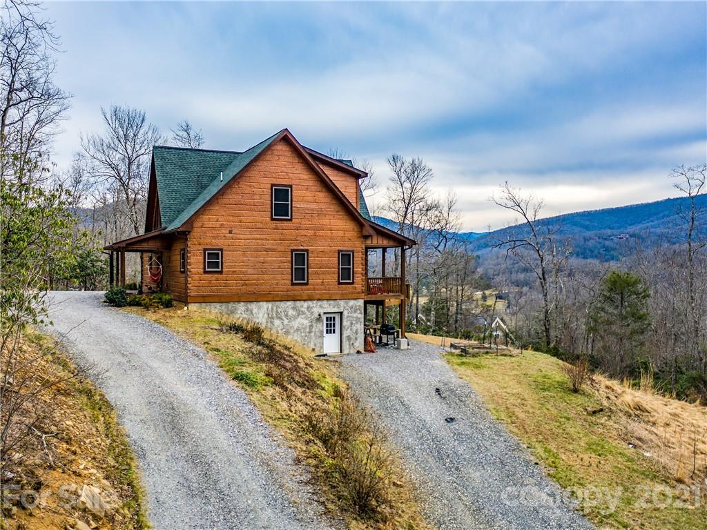 263 Mount Mitchell Drive Burnsville, NC 28714 - Photo 9 of 39 a view of house with yard