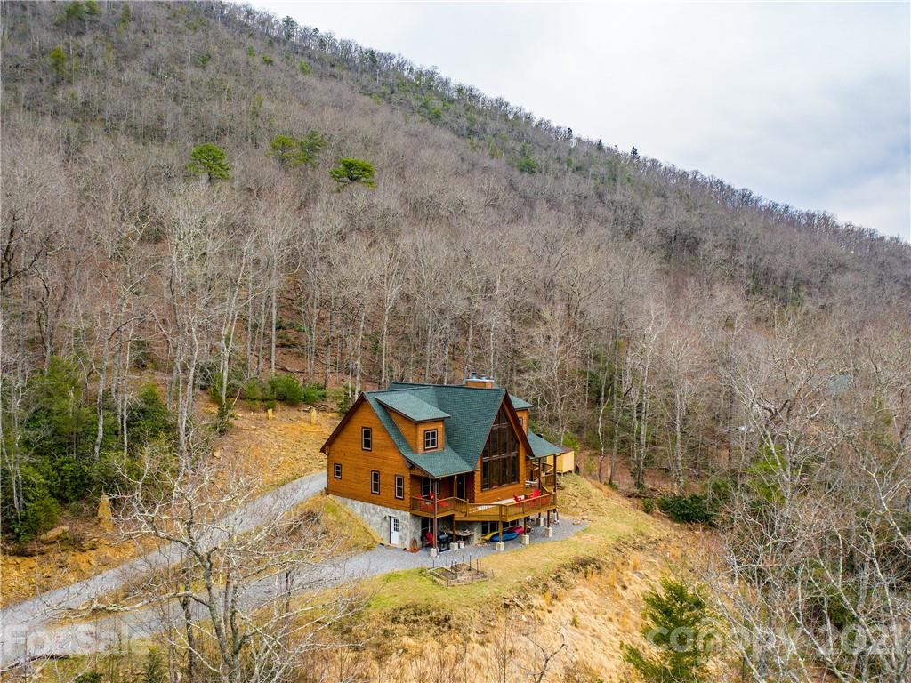 263 Mount Mitchell Drive Burnsville, NC 28714 - Photo 10 of 39 an aerial view of a house with swimming pool and mountain view
