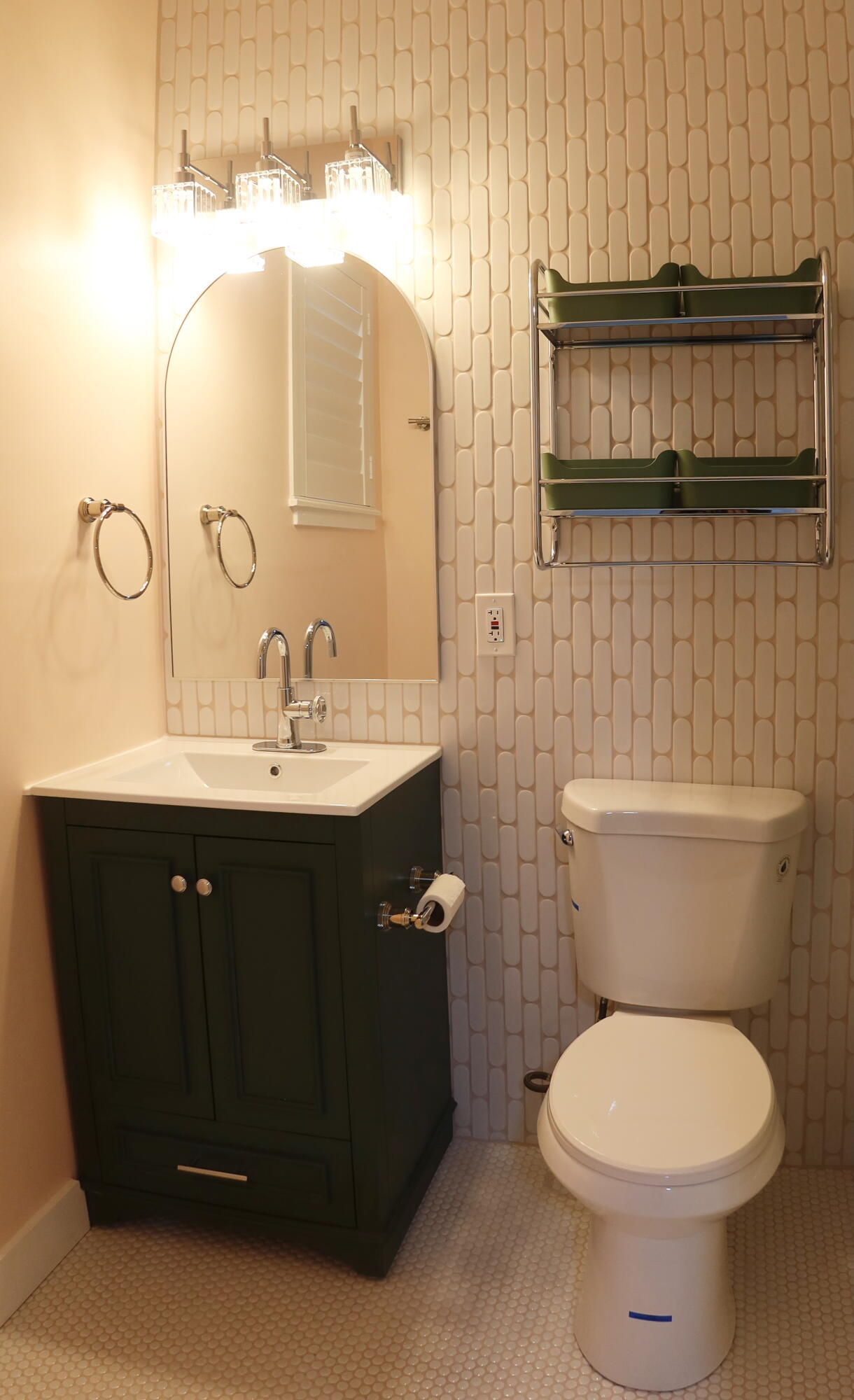 614 Palm Street, Unit 1 West Palm Beach, FL 33401 - Photo 11 of 17 a bathroom with a sink vanity mirror and toilet