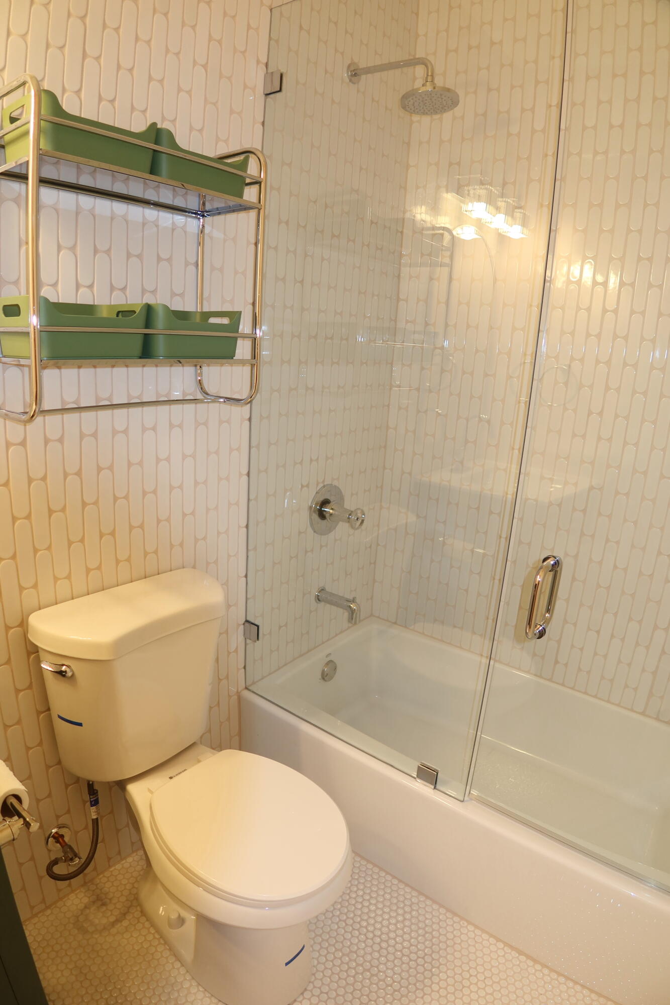 614 Palm Street, Unit 1 West Palm Beach, FL 33401 - Photo 12 of 17 a bathroom with a toilet and a shower