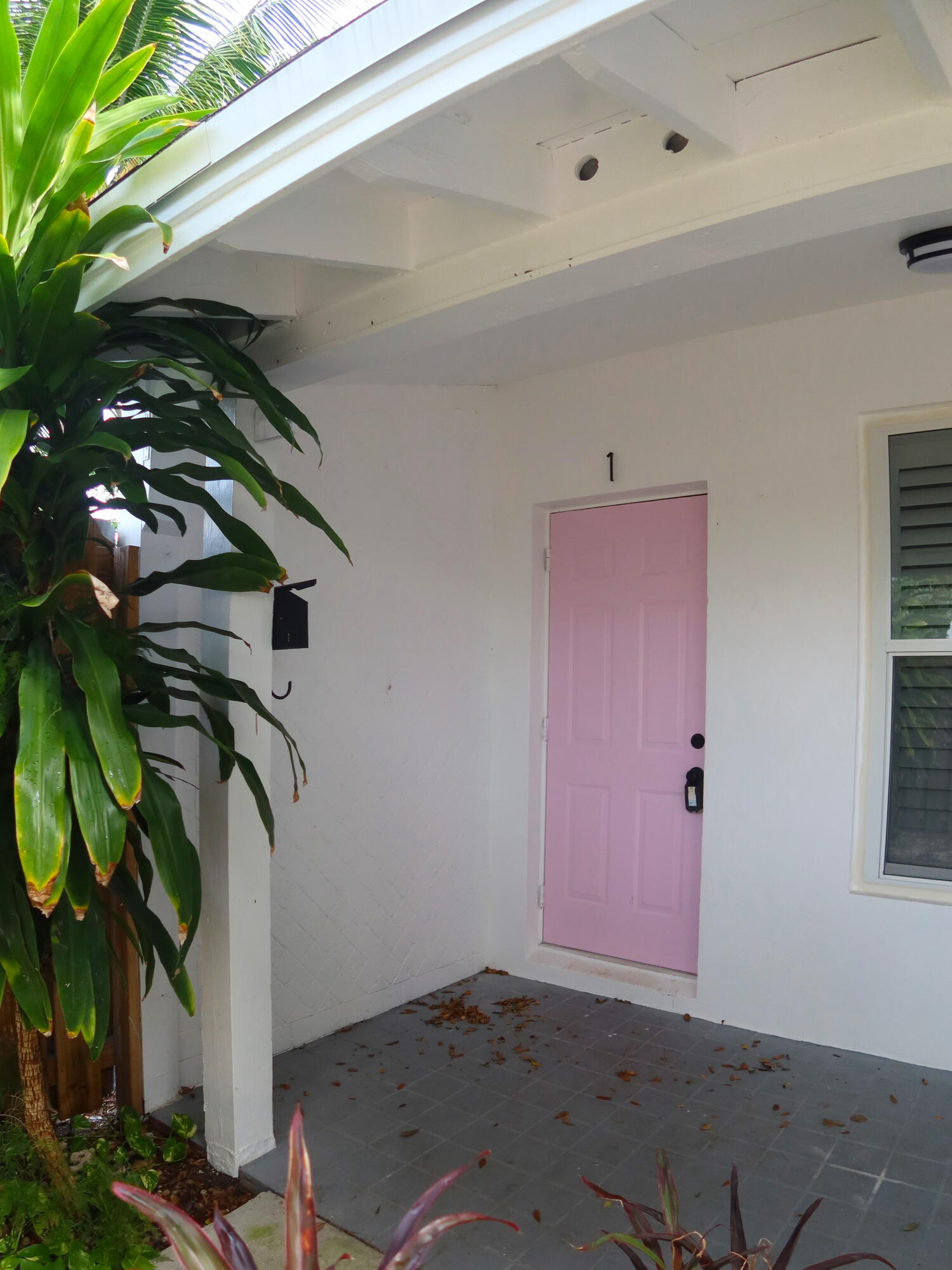 614 Palm Street, Unit 1 West Palm Beach, FL 33401 - Photo 2 of 17 a view of bushes