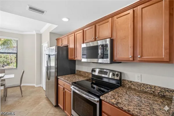 $499,900 | 9815 Giaveno Court, Unit 1222, Naples, FL 34113