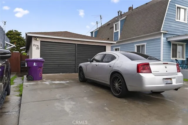 a car parked in front of a house