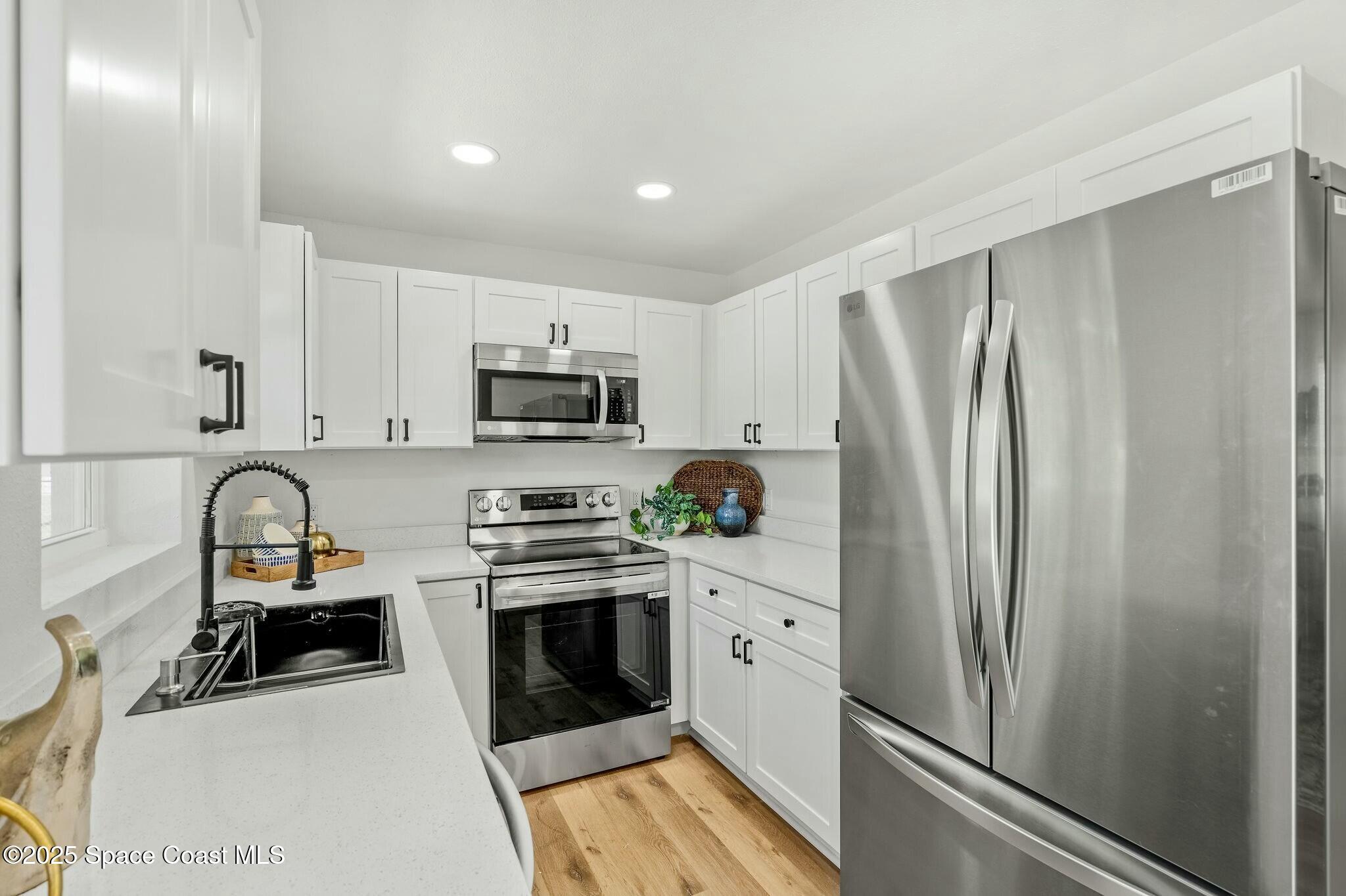 2406 Fatzler Road Melbourne, FL 32935 - Photo 12 of 33 tempImagei04Lt2